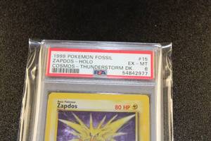 lot 113 image: 1999 Pokemon Fossil Zapdos Holo Cosmos 1562 PSA 6