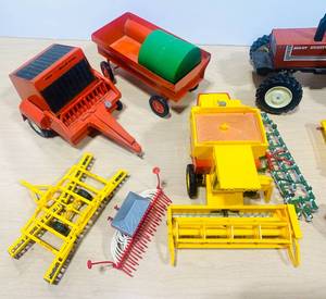 Group of large and small Tractors and Implements