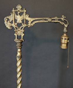 lot 202 image: Two Brass and Marble Floor Lamps with Figural Designs