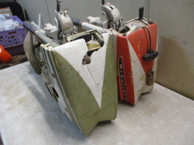 lot 112 image: 2 McCullough 7-12 HP Outboard Motors
