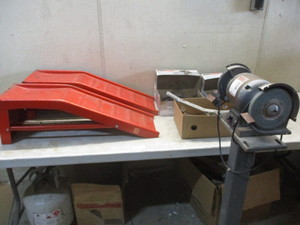 lot 88 image: Come a long, grinder, car ramps and parts