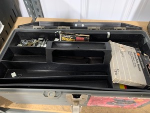 Tool Box full of staples and staplers