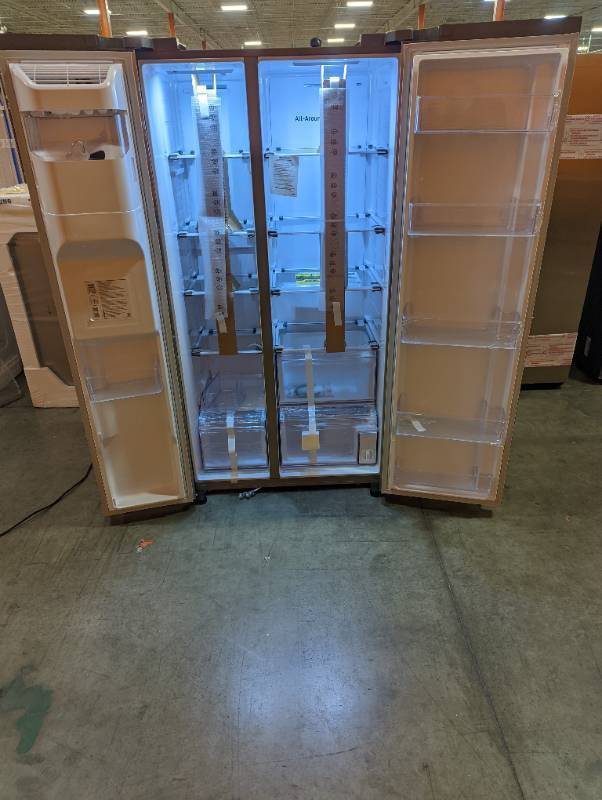 lot 209 image: Samsung 22.0 cu. ft. Side by Side Refrigerator in Fingerprint Resistant Stainless Steel, Counter Depth ( Scratch and Dent) - 1 Year Warranty