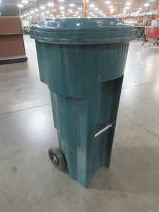 lot 707 image: Toter Greenstone Trash Can with Wheels and Attached Lid - Broken Handle.