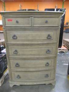 lot 717 image: Pennington 5 Drawer Chest of Drawers, 56 H x 40 W x 18 D. Including 6 drawers with full extension ball bearing drawer glides Felt lined top drawers. - Slight Scratch and Dent.