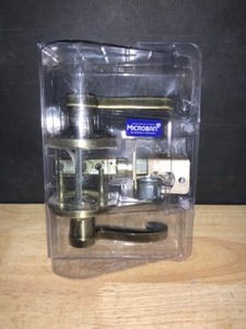 Kwikset Lido Hall & Closet Lever in Antique Brass. See Pictures