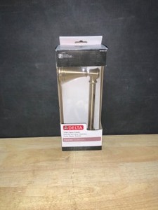 Delta Cassidy Single Post Toilet Paper Holder in Champagne Bronze. See Pictures