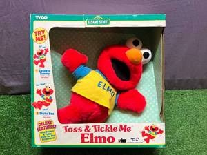 lot 155 image: Toss & Tickle Me Elmo