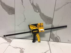 lot 18 image: 24 in. 300 lbs. Trigger Clamp with 3.75 in. Throat Depth by DEWALT  Customer Returns See Pictures