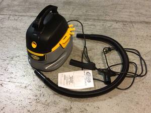 lot 40 image: 2.5 Gal. 1.75-Peak HP Compact WetDry Shop Vacuum with Filter Bag, Hose and Accessories by Stinger Customer Returns See Pictures