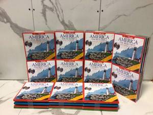 lot 43 image: Lot of Assorted America the beautiful book by Color Music Customer Returns See Pictures