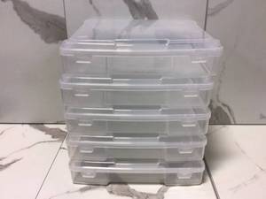 lot 46 image: Portable Scrapbook Case for 12 in. x 12 in. Paper in Clear (5-Pack) by IRIS Customer Returns see Pictures