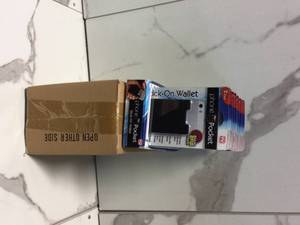 lot 52 image: 24 Pcs Case of Pome Pocket RFID Stick on Wallet S2 Customer Returns See Pictures