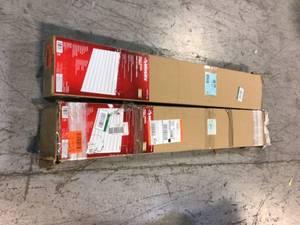 lot 58 image: Lot of Assorted 4-Panel Pack with Trim for Garage Slat Wall System by Husky Customer Returns See Pictures
