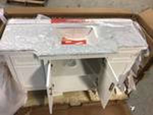 lot 102 image: Sassy 60 in. Vanity in White with Marble Vanity Top in Carrara White by Home Decorators Collection Door Damaged Customer Returns See Pictures