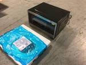lot 104 image: Profile 2.2 cu. ft. Countertop Microwave in Stainless Steel with Sensor Cooking by GE Profile Customer Returns See Pictures