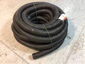lot 1 image: Advanced Drainage Systems 3 in. x 100 ft. Corex Drain Pipe Perforated - Good Condition - Review all pictures