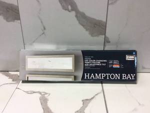 lot 23 image: Straston 24 in. 1-Light Brush Nickel LED Adjustable Bathroom Vanity Light by Hampton Bay Customer Returns See Pictures