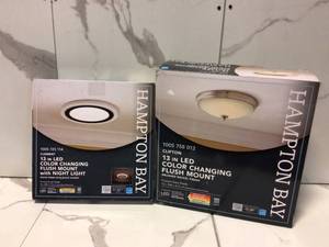 lot 26 image: Lot of 2 Clement 13 in. Round Black Flat Panel SWBWDL Color Choice Selectable LED with Night Light Flush Mount by Hampton Bay