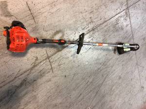 lot 59 image: 21.2 cc Gas 2-Stroke Straight Shaft Trimmer by ECHO Customer Returns See Pictures
