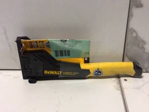 lot 71 image: Carbon Fiber Composite Hammer Tacker by DEWALT Customer Returns See Pictures