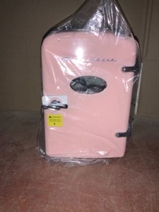 Frigidaire 0.3 cu. ft. 6-Can Retro Mini Fridge in Pink. See Pictures