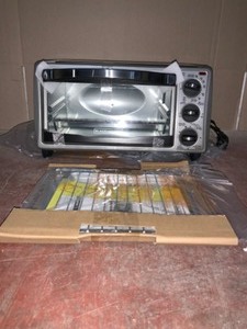 BLACKDECKER 4-Slice Stainless Steel Toaster Oven. See Pictures