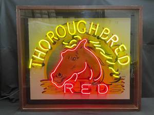 lot 37 image: Thoroughbred Red neon in framed, plexi glass front box