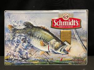 lot 219 image: Schmidts tin tacker with bass fish