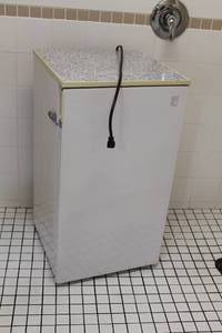 lot 44 image: TAX4DNTAWH Household Mini Refrigerator