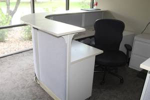 lot 302 image: Curved Office Reception Desk, File Cabinet, Rolling Office Arm Chair, Floor Mat