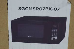 NEW Sunbeam .7 Cu Ft Microwave Oven