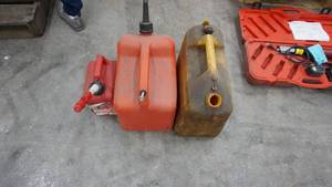 lot 16 image: Three Gasoline Cans
