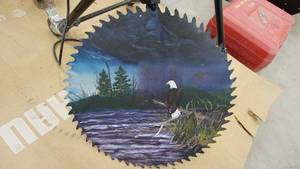 lot 46 image: Painted Saw Blade
