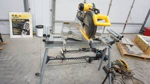 lot 52 image: DeWalt Sliding Compound Saw And Stand