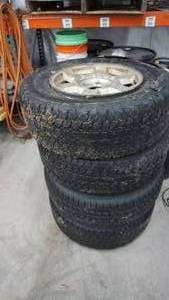 lot 99 image: Four Tires W Rims
