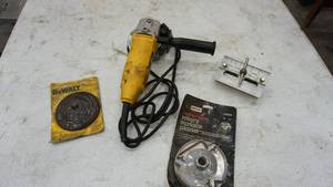 lot 106 image: DW402 4 12 Angle Grinder-DeWalt Rubber Backing Pad-Craftsman Carbide Tipped Rotary Surface Planer- Dowalit
