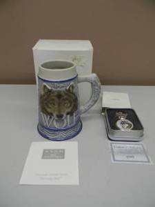 lot 55 image: Avon Majestic Encounters Wolf Pocket Watch & Chain Original Tin & Paperwork - New - Avon American Animal Stein The Gray Wolf - New In Box With Paperwork - SEE PICTURES
