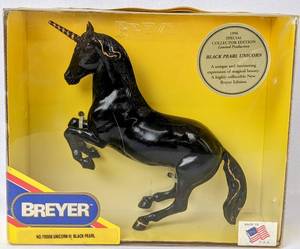 lot 19 image: Breyer 705496 and 705596 Unicorns III White Pearl and Black Pearl 1996 - Special Collector Edition