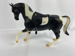 lot 51 image: Breyer #700994 Black Tobiano Roemer Domino with Dressage Saddle 1994