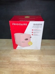 lot 17 image: Frigidaire 0.3 cu. ft. 6-Can Retro Mini Fridge in Pink. See Pictures