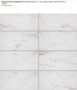 lot 56 image: (20 Cases) of Florida Tile Home Collection Michelangelo White 9 in. x 18 in. Glossy Ceramic Wall Tile (21.8 sq. ft.Case). See Pictures