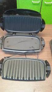 lot 317 image: George Foreman Lean Mean Grilling Machine with changeable Plates.