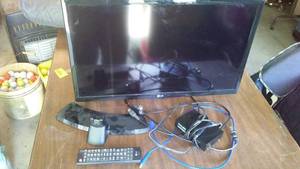 lot 392 image: LG 24 in. TV Model 24LF454B
