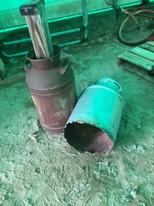 lot 40 image: 2 Vintage Milk Cans