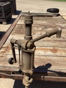 lot 67 image: Vintage cast iron hand crank oil pump