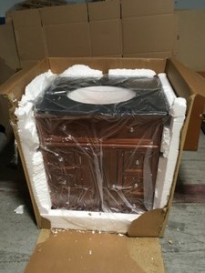 lot 9 image: Home Decorators Collection Hampton Harbor 28 in. W x 22 in. D Bath Vanity in Sequoia with Granite Vanity Top in Black - Has Damage and Cracks - Review all pictures