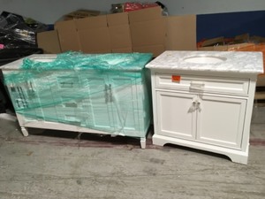 lot 29 image: Mix Lot of Bathroom Vanities in White - Both have Damage - Review all pictures