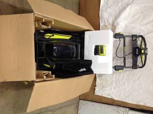 lot 52 image: Ryobi 40V Brushless 20 in. Cordless Walk Behind Self-Propelled Lawn Mower open box customer return see pictures