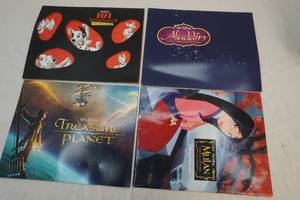 lot 64 image: collectible Disney lithograph portfolios